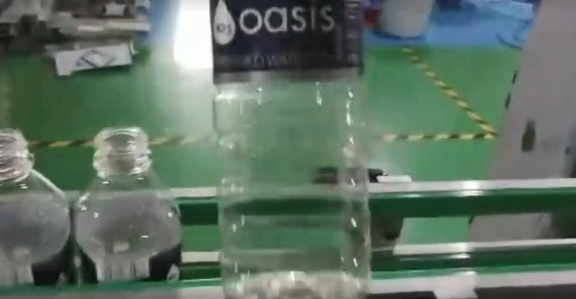 Rotating hot melt adhesive stick square bottle water